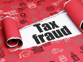 Image showing Law concept: black text Tax Fraud under the piece of  torn paper