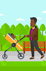 Image showing Man pushing pram.