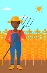 Image showing Farmer with pitchfork.