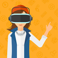 Image showing Woman wearing virtual reality headset.