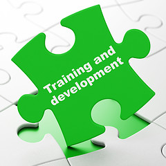Image showing Education concept: Training and Development on puzzle background