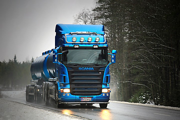 Image showing Blue Scania R500 Tank Truck Trucking in Fog and Rain