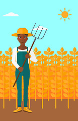 Image showing Farmer with pitchfork.