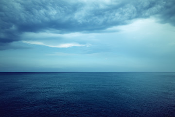 Image showing Dark blue sea and stormy clouds