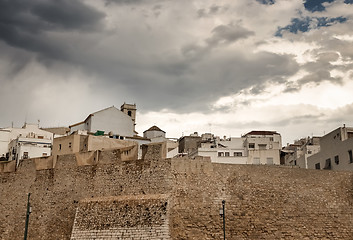 Image showing Dramatic sky over the houses of Peniscola, Spain