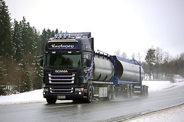 Image showing Purple Scania R500 Tank Truck on Rainy Day