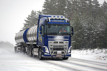 Image showing Volvo FH Tank Truck on The Road in Snowfall