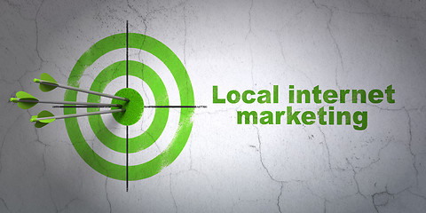 Image showing Marketing concept: target and Local Internet Marketing on wall background