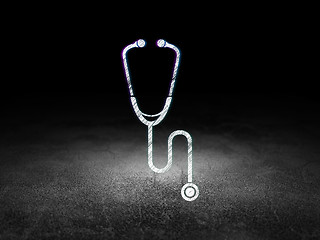 Image showing Healthcare concept: Stethoscope in grunge dark room