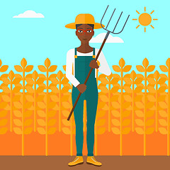 Image showing Farmer with pitchfork.