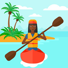 Image showing Woman riding in canoe.