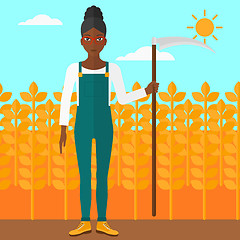 Image showing Farmer on the field with scythe.