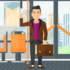 Image showing Man standing inside public transport.