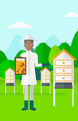 Image showing Bee-keeper at apiary.