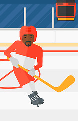 Image showing Ice-hockey player with stick.