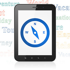 Image showing Vacation concept: Tablet Computer with Compass on display
