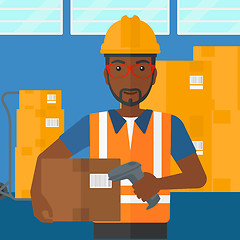 Image showing Worker checking barcode on box.