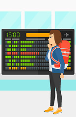 Image showing Woman looking at schedule board.