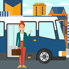 Image showing Woman standing near bus.