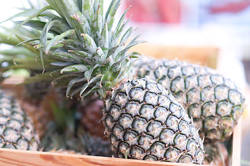 Image showing pineapples in box