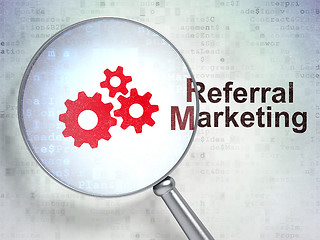 Image showing Marketing concept: Gears and Referral Marketing with optical glass