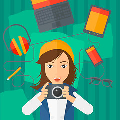 Image showing Woman holding camera.