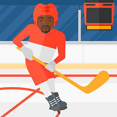 Image showing Ice-hockey player with stick.