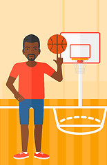 Image showing Basketball player spinning ball.