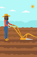 Image showing Farmer on the field with plough.