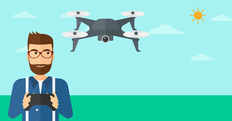 Image showing Man flying drone.