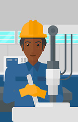 Image showing Man working with industrial equipment.