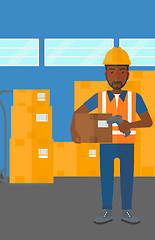 Image showing Worker checking barcode on box.