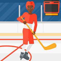 Image showing Ice-hockey player with stick.