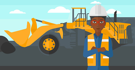 Image showing Miner with mining equipment on background.