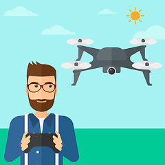 Image showing Man flying drone.