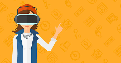 Image showing Woman wearing virtual reality headset.