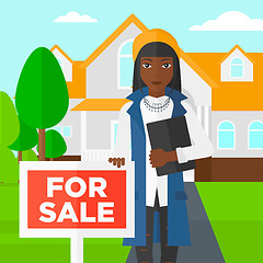 Image showing Real estate agent offering house.