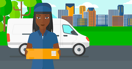 Image showing Woman delivering box.