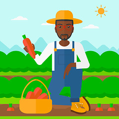 Image showing Farmer collecting carrots.