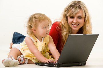 Image showing Mom and baby with laptop