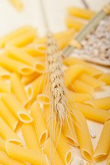 Image showing Italian pasta penne with wheat