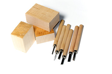 Image showing wood carving tools with wood