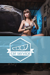 Image showing Icon car repairs on the background of a woman mechanic