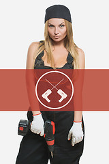 Image showing sexy female holding a cordless screwdriver. Repair icon in the background woman.