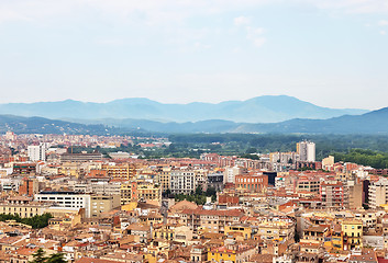 Image showing Picturesque city of Girona surrounded by mountains