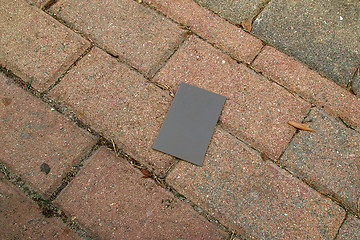 Image showing photography grey card in shade