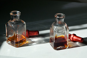 Image showing two square eye dropper bottles