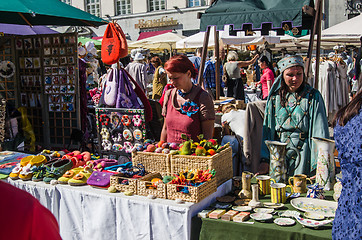 Image showing Master crafts sell their products on the medieval market