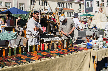 Image showing Master crafts sell their products on the medieval market