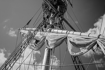 Image showing Mast with sails of an old sailing vessel, black and white photo